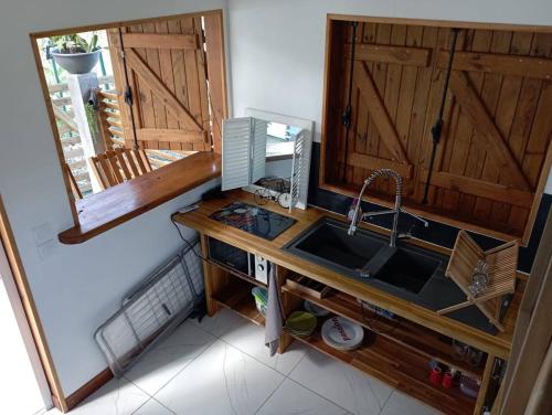 Φωτογραφία από το άλμπουμ του TINY HOUSE avec vues σε Capesterre-Belle-Eau