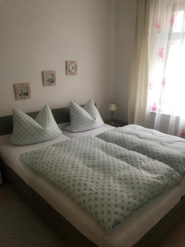 Postel nebo postele na pokoji v ubytování Ferienwohnung über Greiz