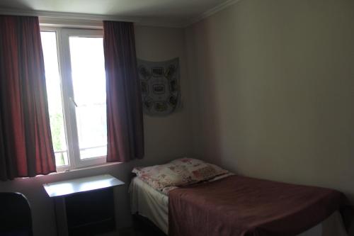 Postel nebo postele na pokoji v ubytování Nunuka House