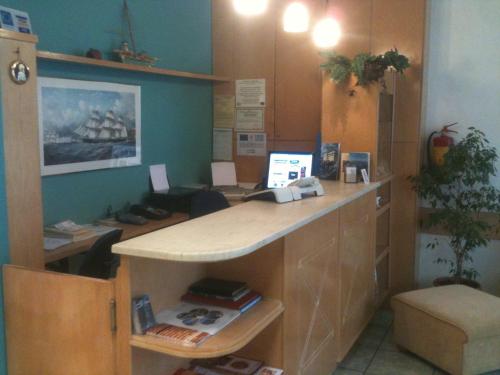 an office with a desk with a computer on it at Hotel Avra in Volos