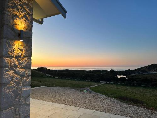 a view of the ocean from a house at Middle River Vista Beach House in Stokes Bay