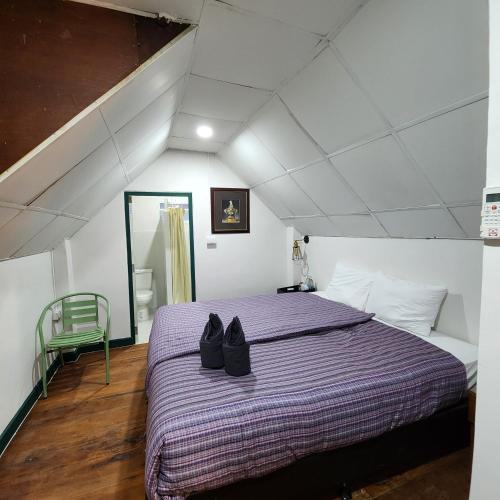 Postel nebo postele na pokoji v ubytování Chandra Home - จันทรา โฮม