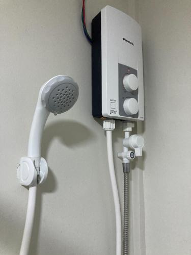 a hair dryer and a blow dryer at BH Mangrove Condos in Mactan