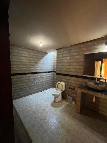 Katil atau katil-katil dalam bilik di Coral Voice 1 Homestay & Lumbung