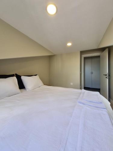 Ένα ή περισσότερα κρεβάτια σε δωμάτιο στο AHG Atlas Apartments