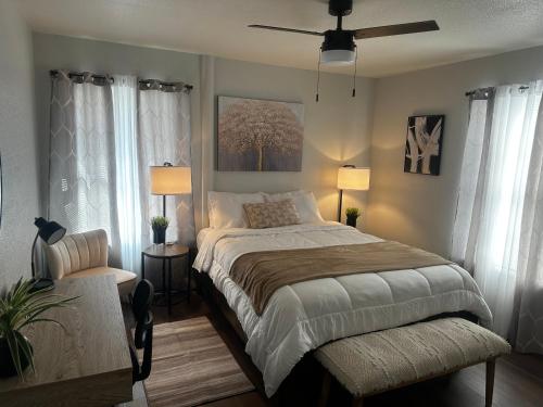 a bedroom with a bed and a ceiling fan at Eagle Stay 5 in Eagle Pass