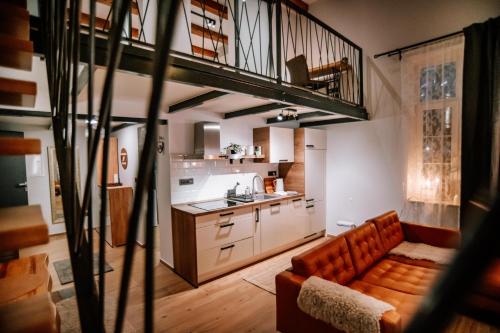 Η κουζίνα ή μικρή κουζίνα στο Apartman Saturn