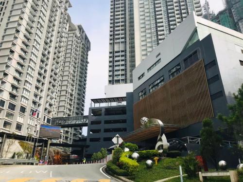 a street in a city with tall buildings at Highest Floor, Skyline Studio for 4Pax In Hoverland Genting Highlands in Genting Highlands