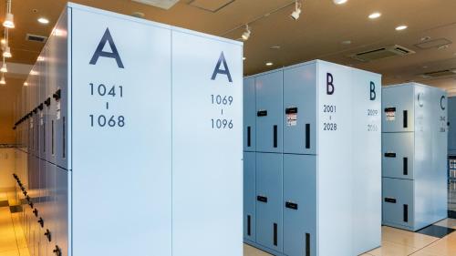 a row of lockers in a building at Toyoko Inn Fuji Kawaguchiko Ohashi in Fujikawaguchiko