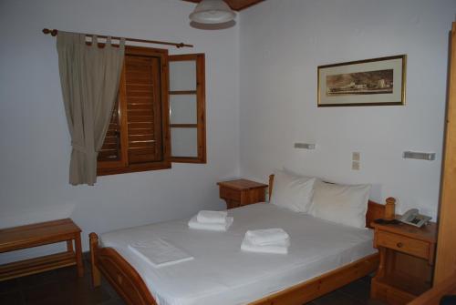 Posteľ alebo postele v izbe v ubytovaní Siroco's Rooms And Studios