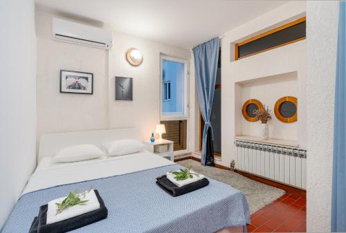 Ένα ή περισσότερα κρεβάτια σε δωμάτιο στο Silk Tree House