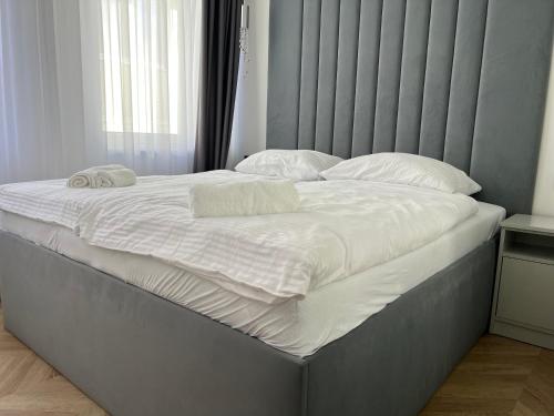 Ένα ή περισσότερα κρεβάτια σε δωμάτιο στο Apartmány Ambiente