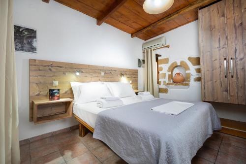 Llit o llits en una habitació de Topolia 1 Bedroom Villa