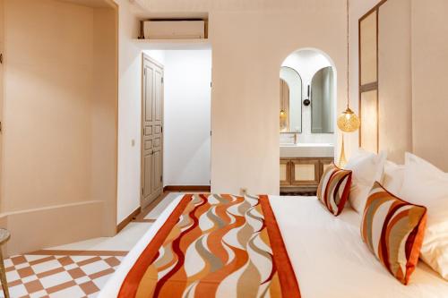 Letto o letti in una camera di Riad Nyla Wellness and Spa