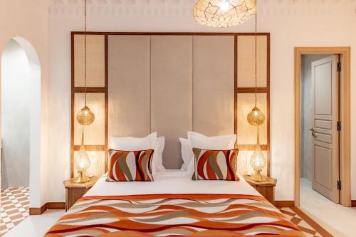 Letto o letti in una camera di Riad Nyla Wellness and Spa