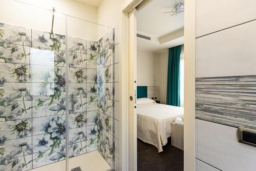 LUAL Bleisure Hotelにあるベッド