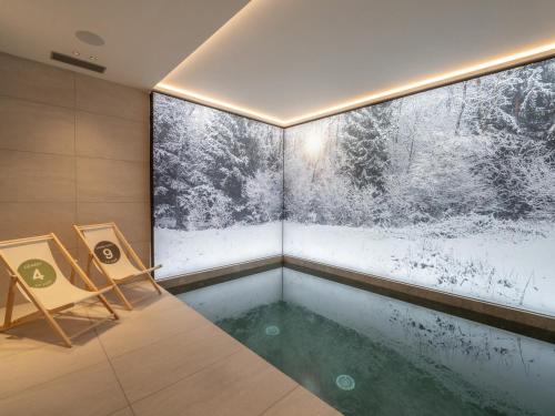 Chalet de luxe familial avec piscine et sauna, proche des pistes et commodites a Courchevel Le Praz - FR-1-568-37
