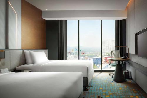 Un ou plusieurs lits dans un hébergement de l'établissement Doubletree By Hilton Shah Alam I-City