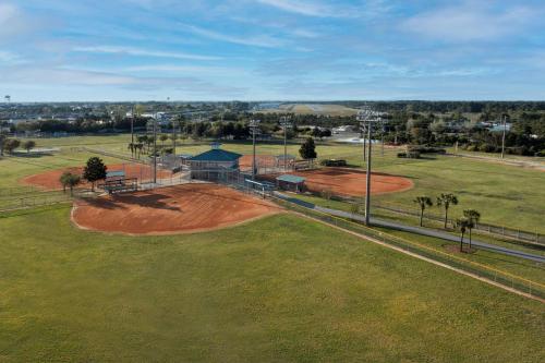 an aerial view of a baseball field with a ballpark at Homewood Suites By Hilton Destin in Destin