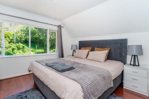 Postel nebo postele na pokoji v ubytování Hout Bay Gem - Elise Way