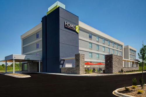 a hotel building with a hilton sign on it at Home2 Suites By Hilton Shepherdsville Louisville South in Shepherdsville