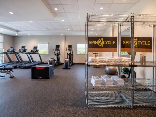a fitness room with treadmills and weights at Home2 Suites By Hilton Santa Rosa Beach in Santa Rosa Beach