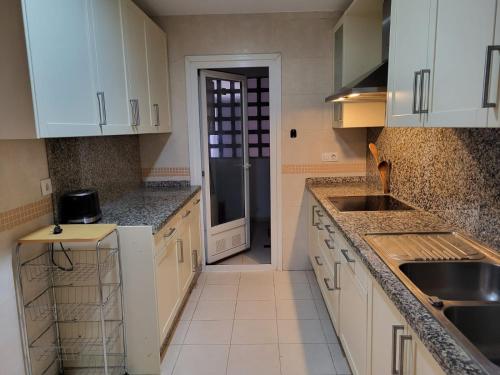 Dapur atau dapur kecil di Apartamento Vistahermosa