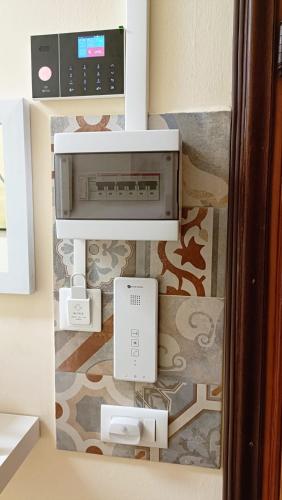a room with a wall with a computer on it at 20 VENTI in Angolo Terme