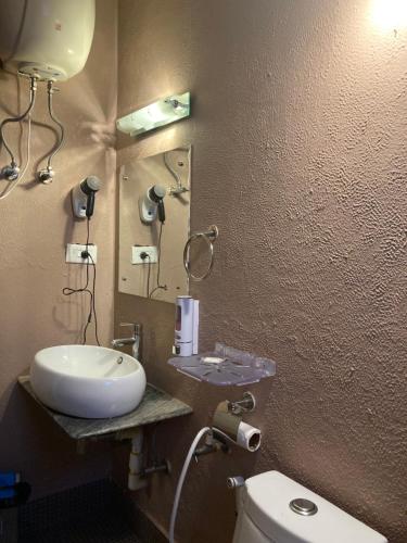 Ett badrum på Maya Inn