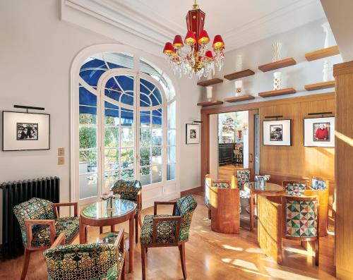 Гостиная зона в Hôtel Belles Rives