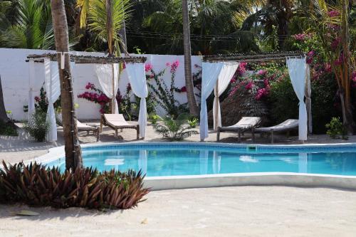 Kolam renang di atau dekat dengan Boutique Villa Unaweza