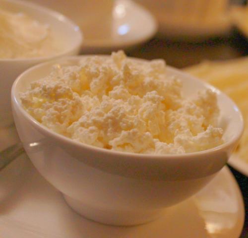 a bowl of food sitting on a table at Hotel Winoterra in Tbilisi City