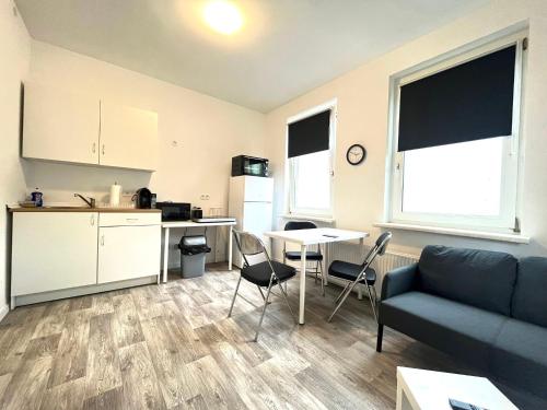 Η κουζίνα ή μικρή κουζίνα στο Studio-Apartments für Monteure & Businessgäste Zentral in Neumünster