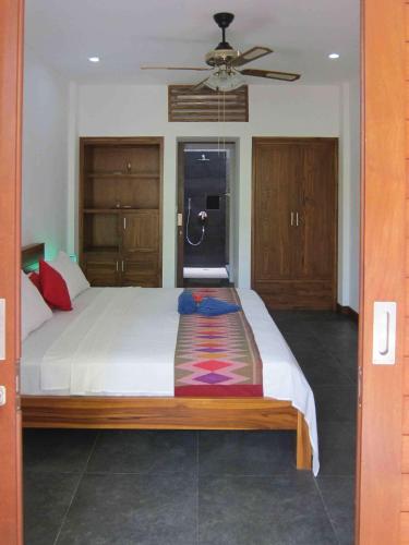Postel nebo postele na pokoji v ubytování Dream Divers Resort