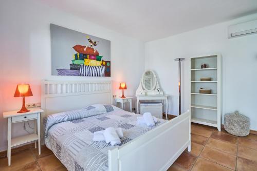 Postel nebo postele na pokoji v ubytování Villa Brusc