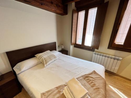 Postel nebo postele na pokoji v ubytování Casa Bernat Apartament
