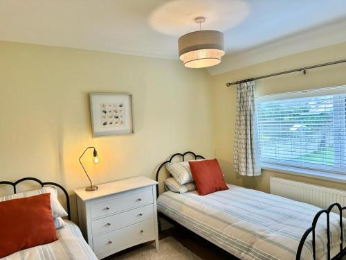 Ein Bett oder Betten in einem Zimmer der Unterkunft Pass the Keys Pembroke Dock Hidden Gem