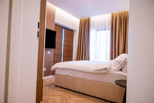 Postel nebo postele na pokoji v ubytování Papi House