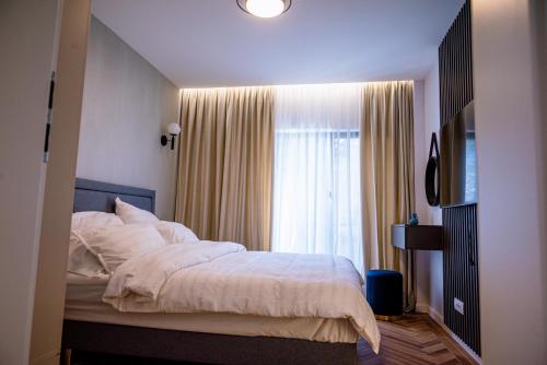 Postel nebo postele na pokoji v ubytování Papi House