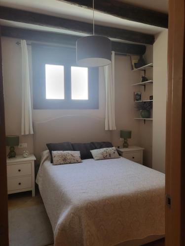 Postel nebo postele na pokoji v ubytování Acogedor apartamento dúplex Sandiniés