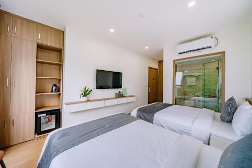 Televisyen dan/atau pusat hiburan di CAT BA ECO HOTEL