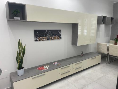 a kitchen with a counter top in a room at San Donato Apartment in Barletta