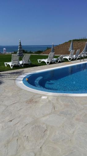 Swimmingpoolen hos eller tæt på Toma's Residence - Front Beach