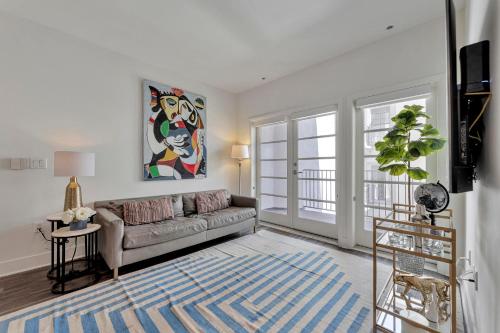 a living room with a couch and a table at 7 Large Down Town Santa Monica Apartment in Los Angeles