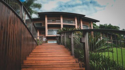 Um jardim em Village Du Lac Hotel
