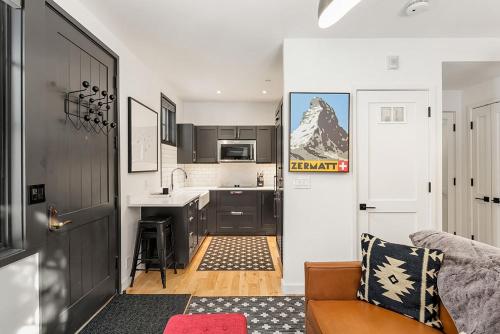a small kitchen with a sink and a counter at Christiana Lodge 102A Studio in Aspen with Hot Tub access in Aspen