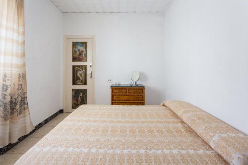 Ένα ή περισσότερα κρεβάτια σε δωμάτιο στο La Matea
