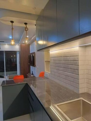Kuchyň nebo kuchyňský kout v ubytování Elegant Xanadu Studio 604 -Pool, Airport, CC2 Mall