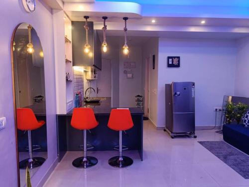 Posezení v ubytování Elegant Xanadu Studio 604 -Pool, Airport, CC2 Mall