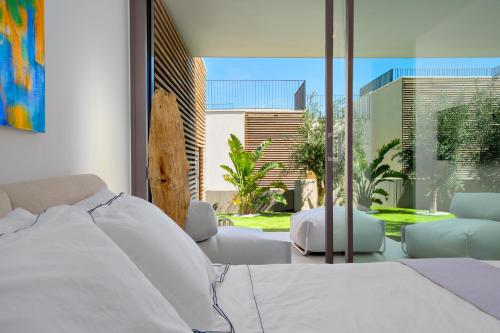 Postel nebo postele na pokoji v ubytování Villa MIrto - Golfo Aranci, Baia Caddinas Sardinia, Costa Smeralda